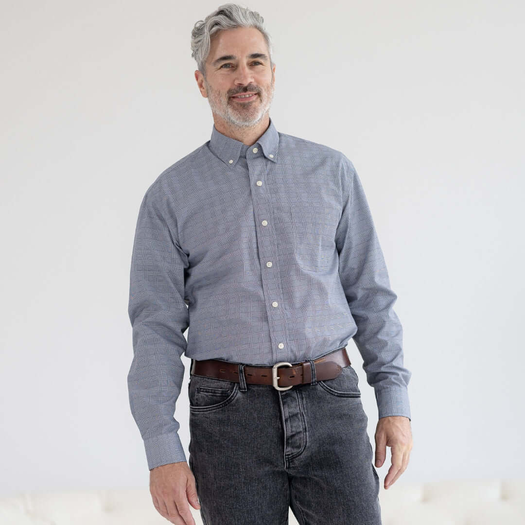 Model wearing a stretch long sleeve navy plaid button-down shirt with magnetic closures, showcasing adaptive fashion.