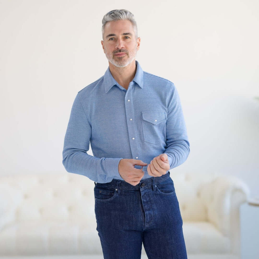 Stylish man wearing an adaptive casual western knit twill shirt in star sapphire color with magnetic buttons and chest pocket.