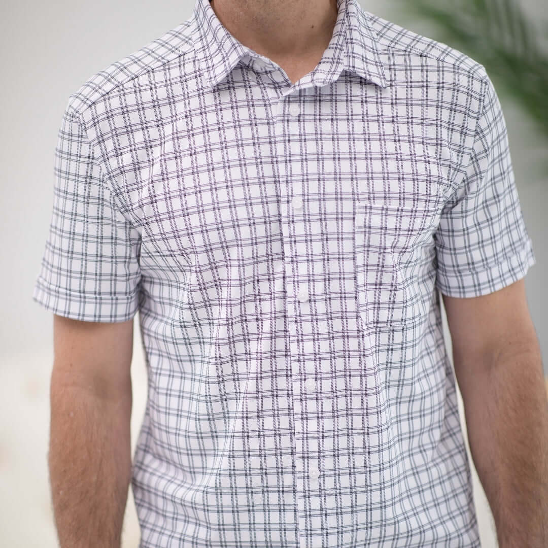 Adaptive cooling magnetic shirt in black and white grid design, ideal for limited mobility and comfort.