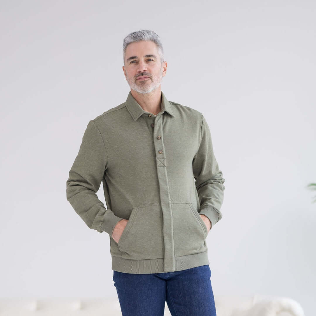Man wearing the Adaptive Magnetic Front Sweatshirt in Heathered Olive, designed for comfort and mobility.
