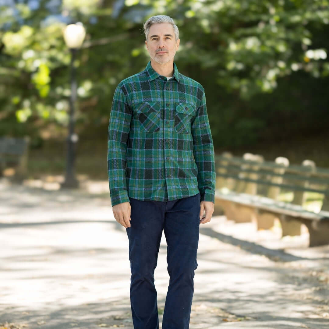 Adaptive Teal Plaid Flannel Shirt with Magnetic Closures worn by a man in a park.