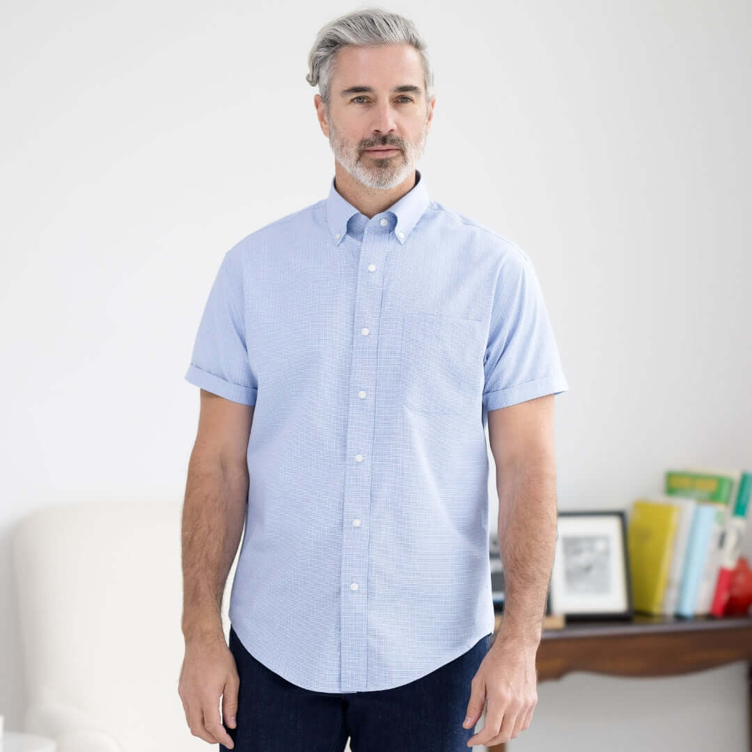 Blue check short sleeve button-down collar shirt with magnetic closures, designed for comfort and accessibility.