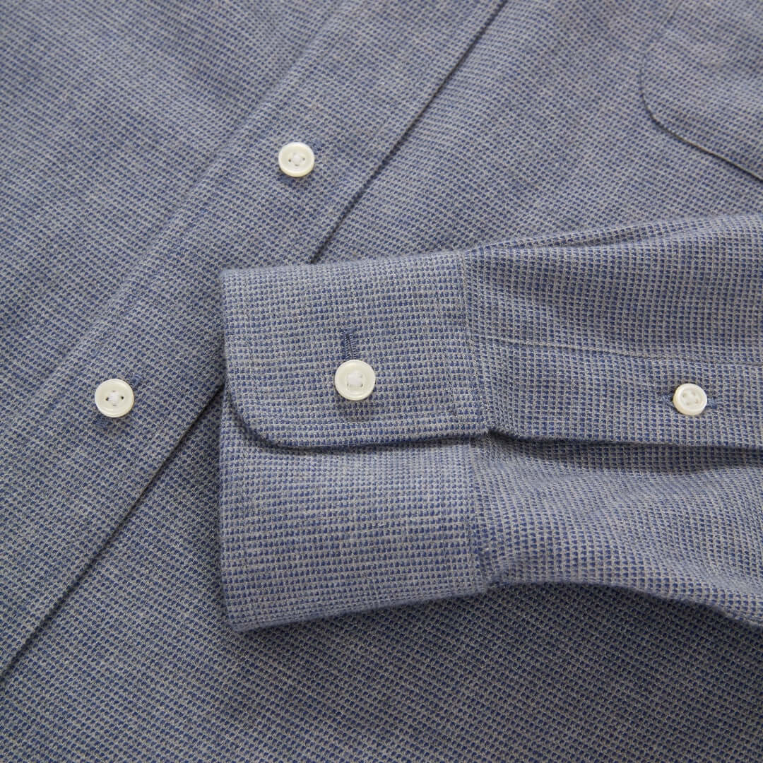 Blue Grey Brushed Flannel Long Sleeve Button Down Collar Shirt with Magnetic Closures close-up view of cuff and buttons.