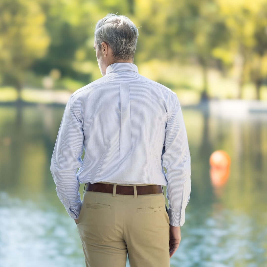 Brown Stripe Long Sleeve Button Down Collar Shirt with Magnetic Closures worn outdoors by a man with gray hair, seen from the back.