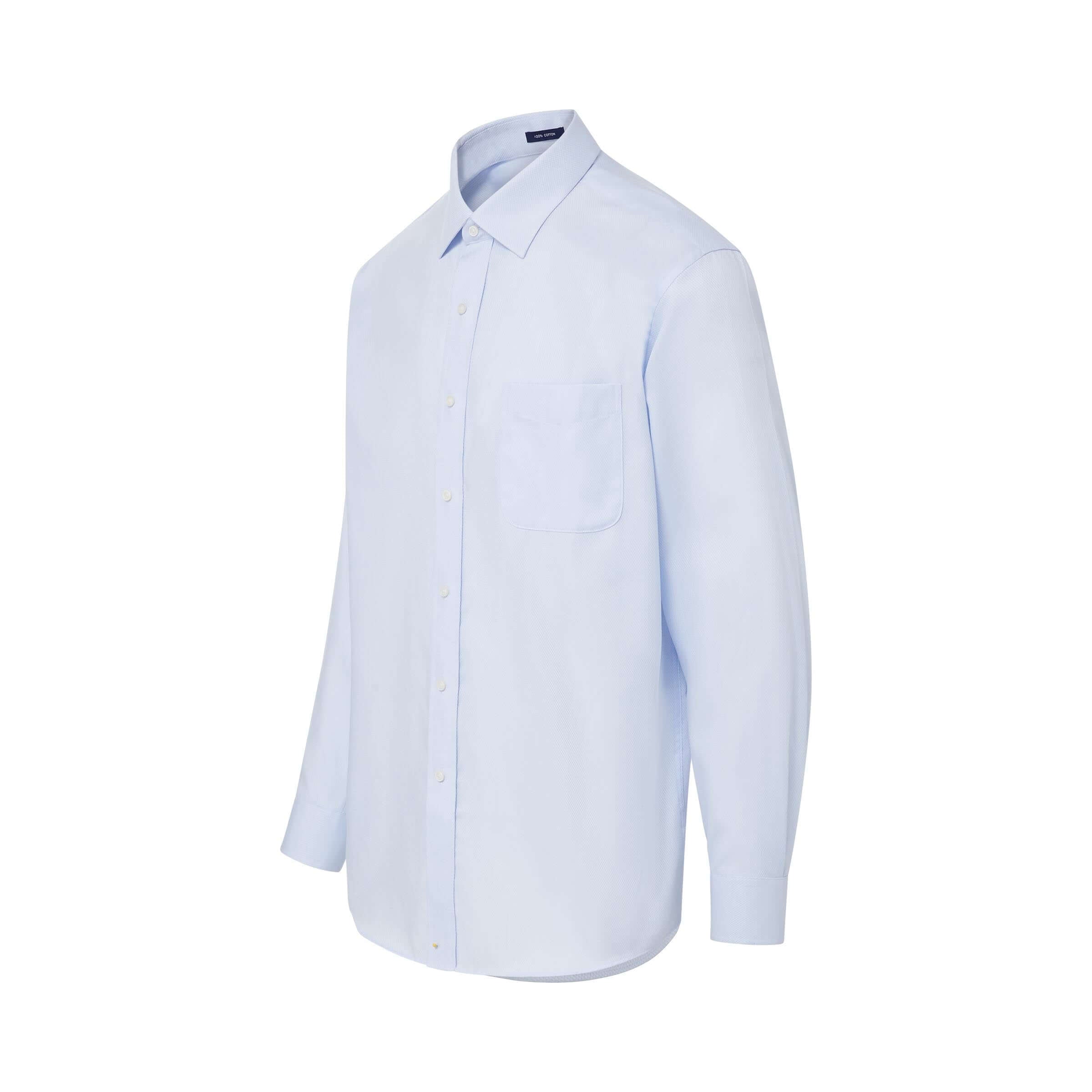 Light blue 'Ryan' dress shirt with adaptive magnetic closures, designed for comfort and style.
