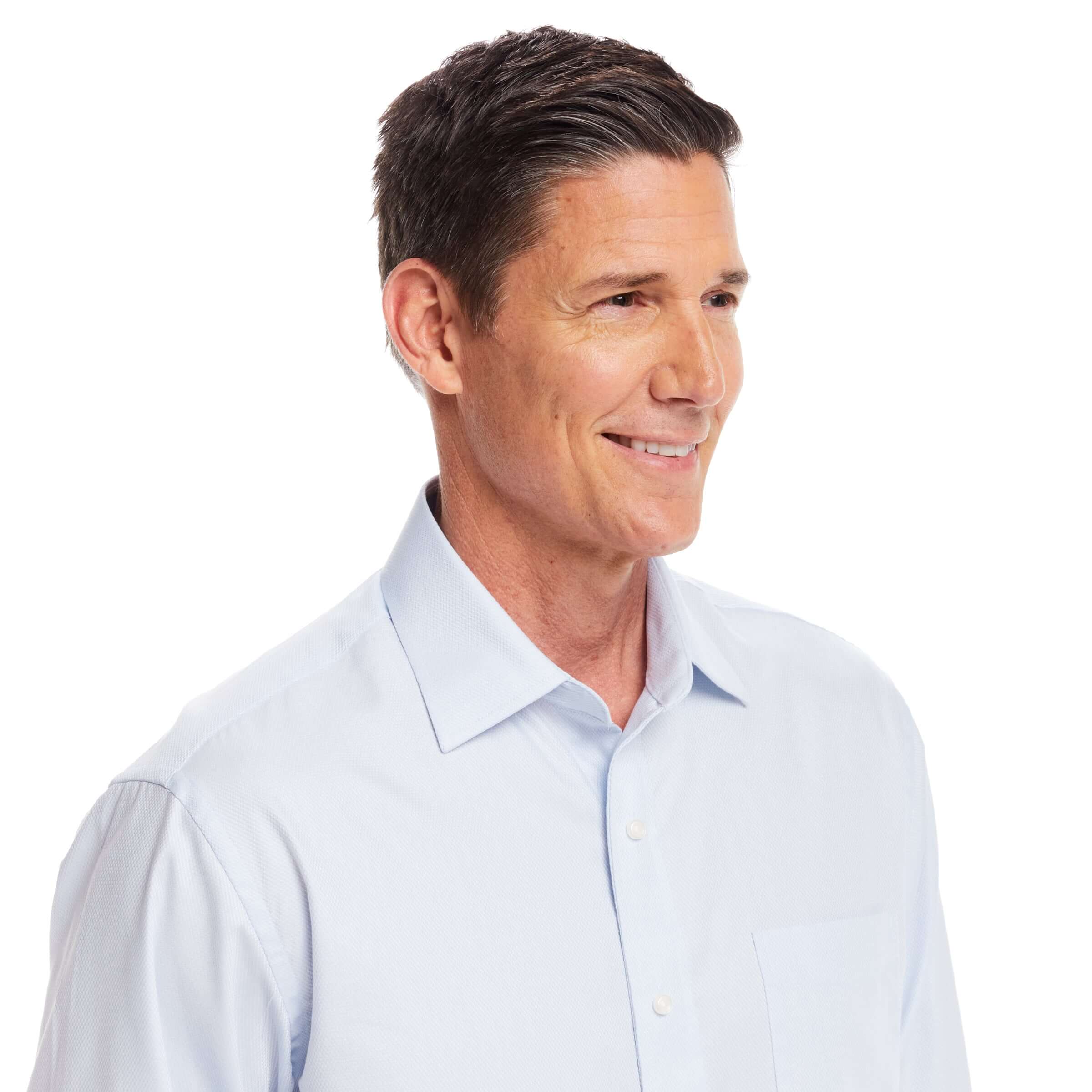 Model wearing a Classic Long Sleeve Light Blue 'Ryan' Dress Shirt, featuring magnetic closures for adaptive wear.