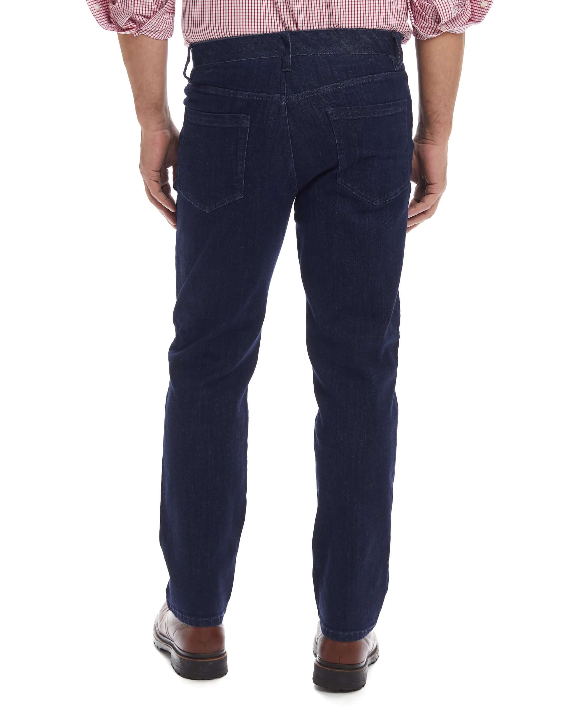Back view of men's indigo five pocket jeans with magnetic closures, showcasing a classic fit and stylish design.