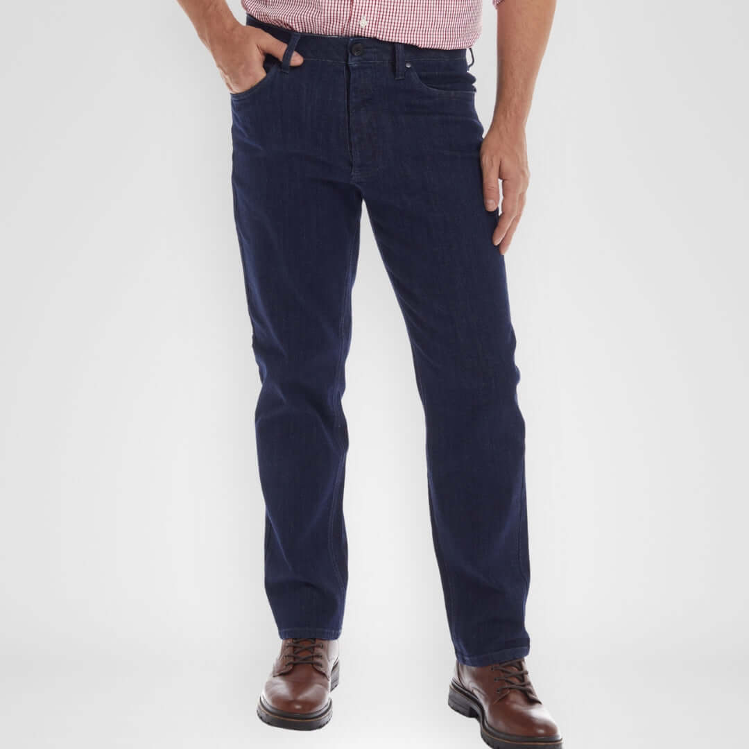 Man wearing Denim ‘MVP’ Five Pocket Jean with Magnetic Closures in Indigo color, showcasing classic straight-fit style.