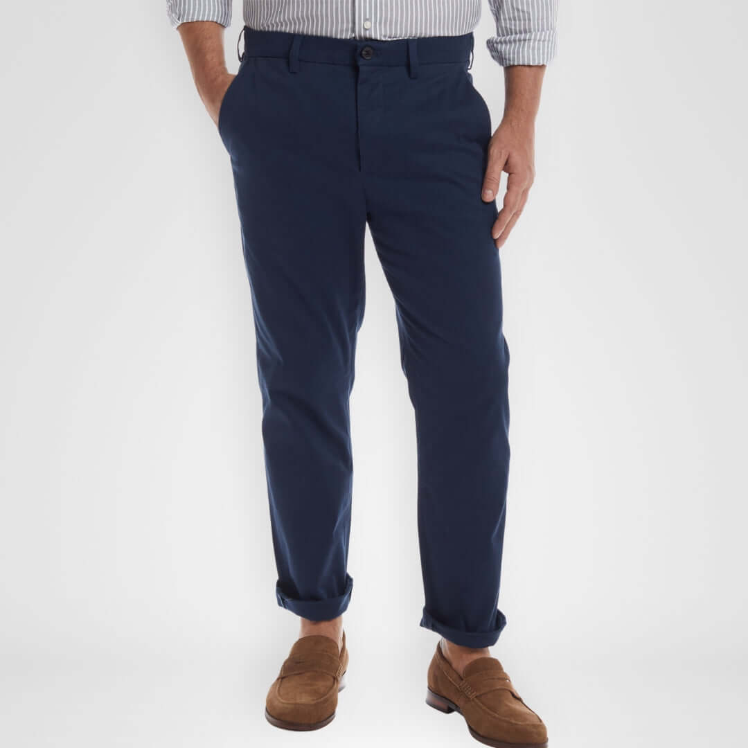 Man wearing Flat Front Adaptive Chino Twill Pant in Navy, designed for mobility challenges and easy care.