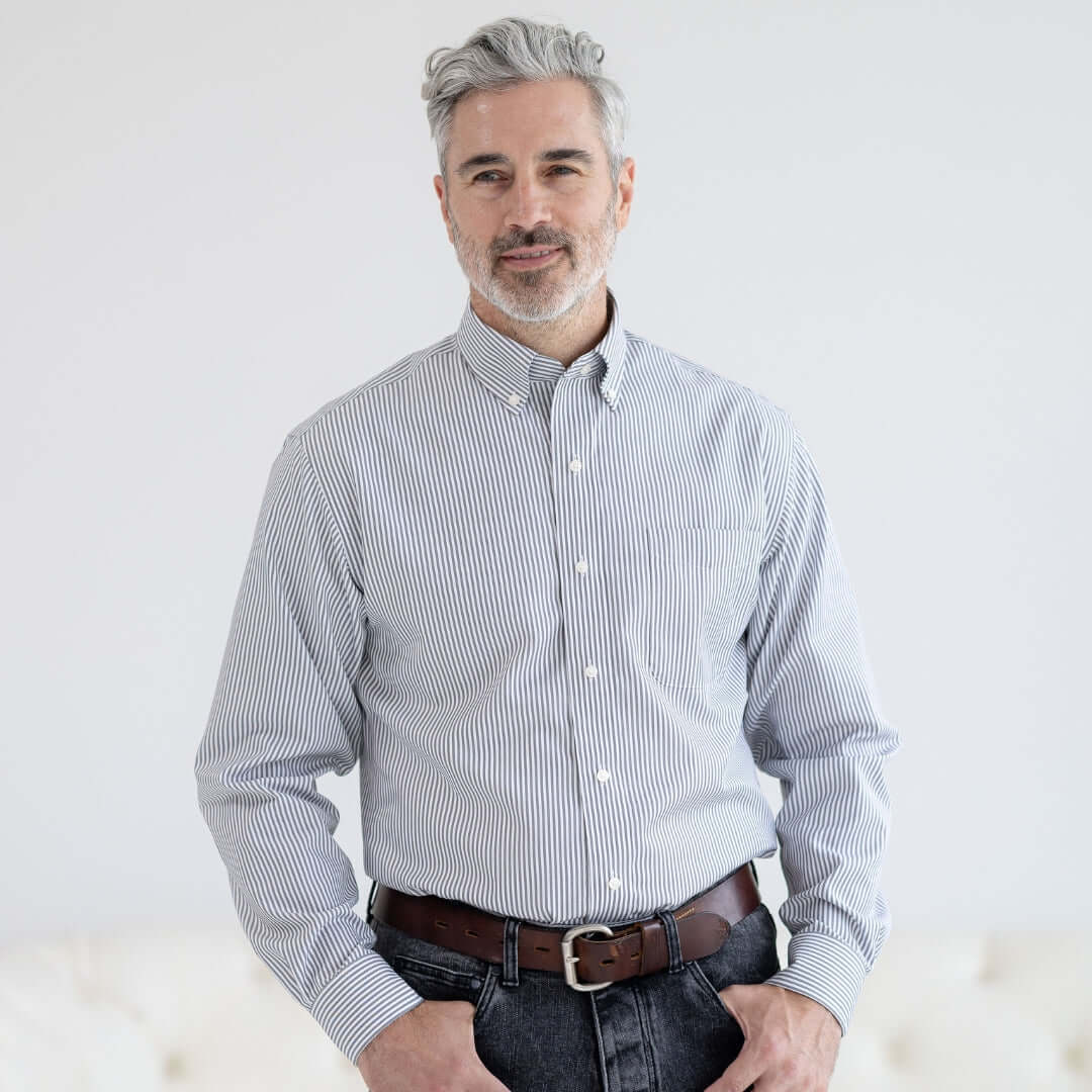 Grey stripe long sleeve button-down collar shirt with magnetic closures, worn by a man standing against a neutral background.