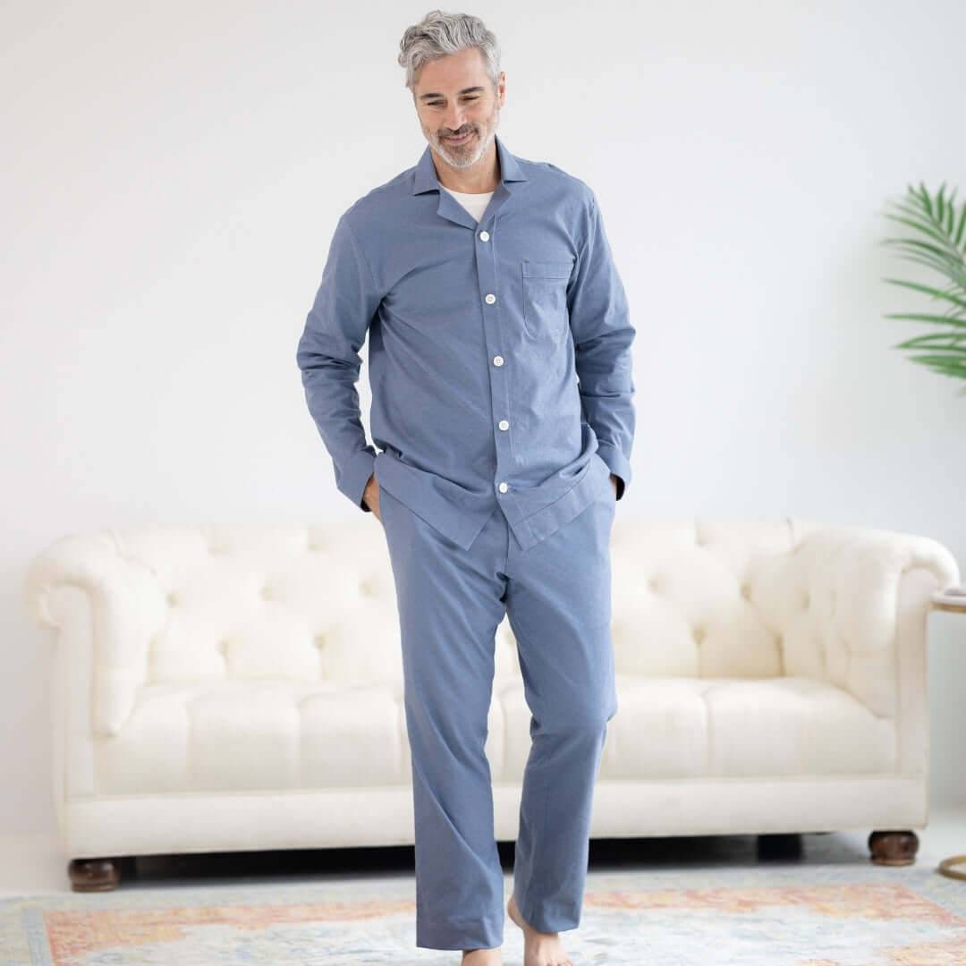 Blue Brushed Flannel Pajama Pant with Magnetic Fly worn by a man standing in a cozy living room.