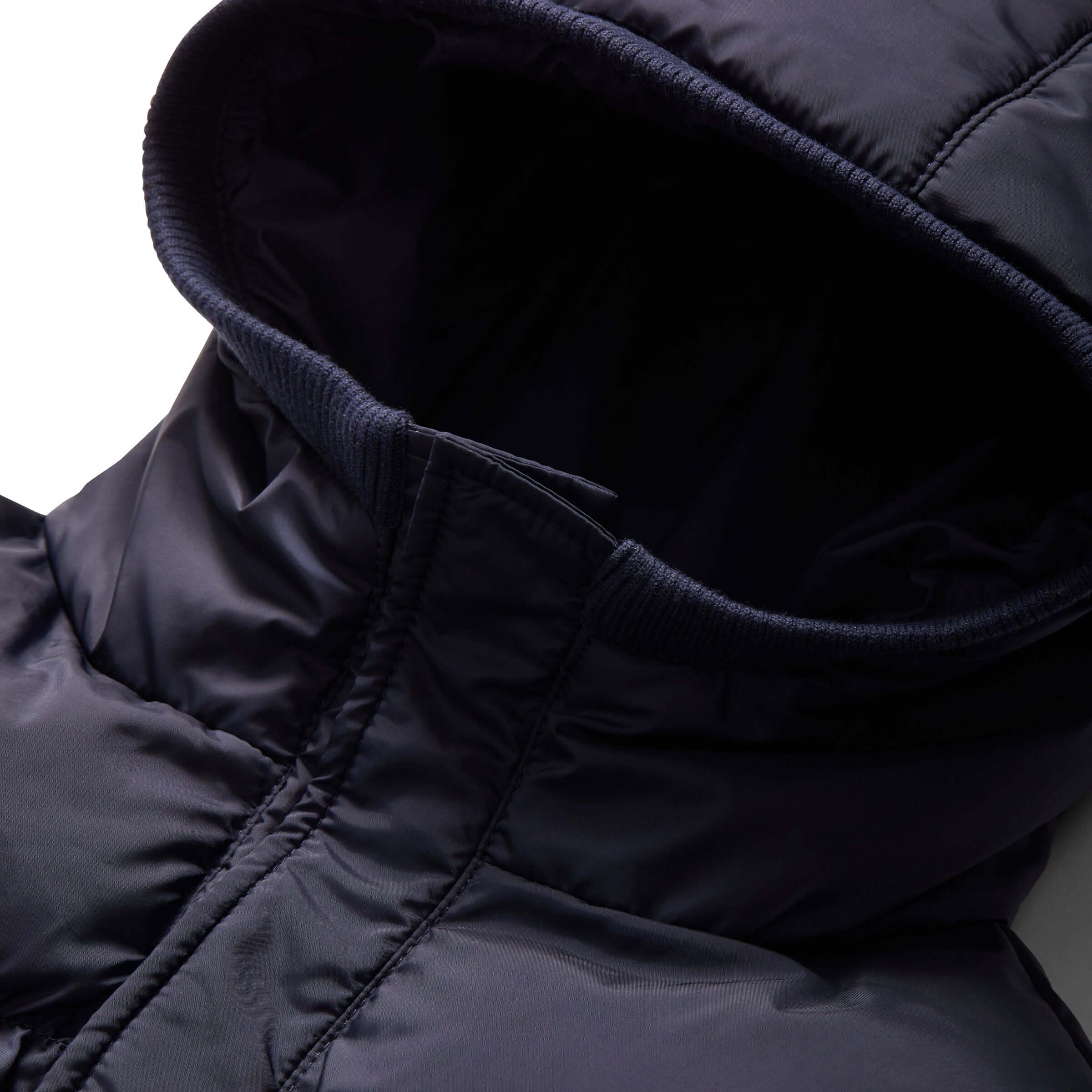 Close-up of the navy MagnaMini kids' water-resistant puffer coat hood, showcasing soft material and comfortable design.