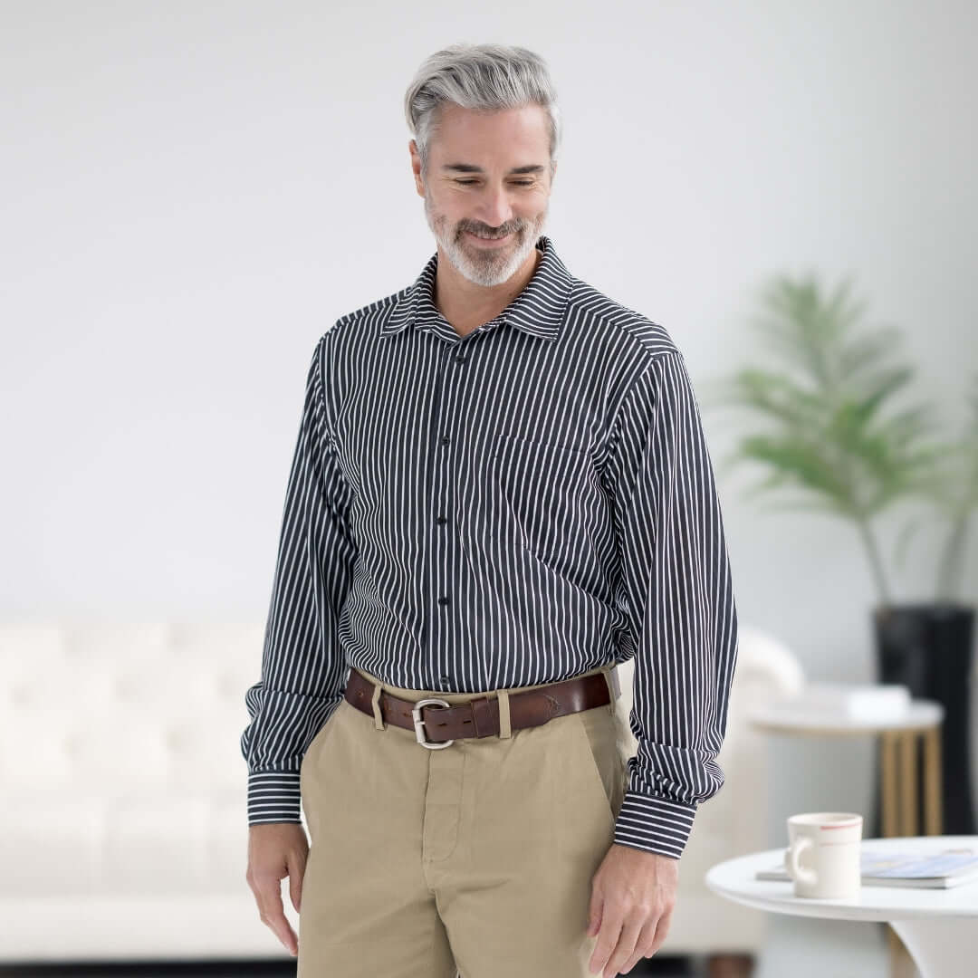 Stylish man wearing the MagnaReady black stripe magnetic front long sleeve tech shirt with pocket.