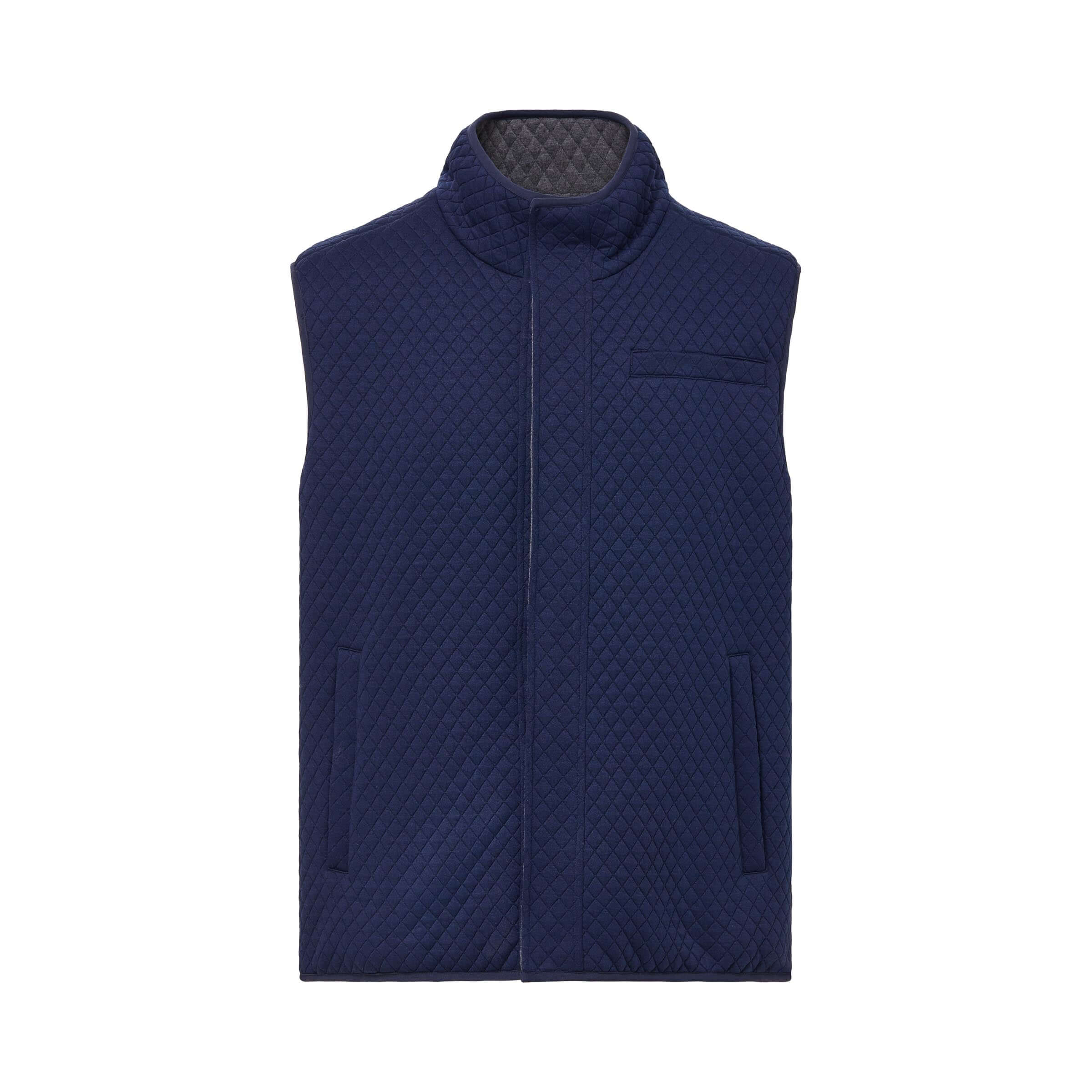 Navy reversible diamond quilted magnetic button vest showcasing luxury and adaptive comfort by MagnaReady®.