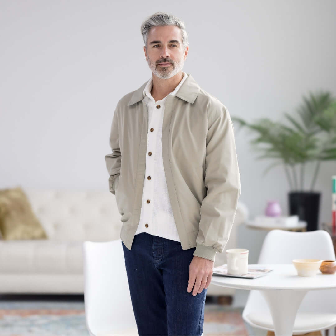 Man wearing MagnaReady Weatherproof classic magnetized golf jacket in New Stone, stylish and accessible for limited mobility.