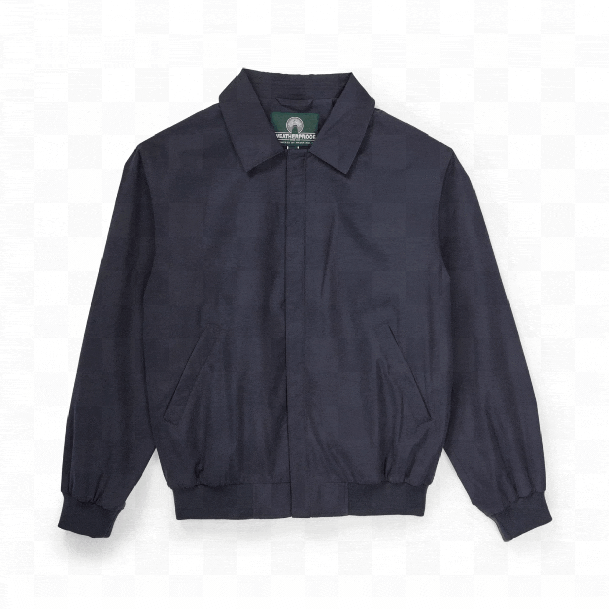 MagnaReady® X Weatherproof navy golf jacket with magnetic closures for adaptive wearability.