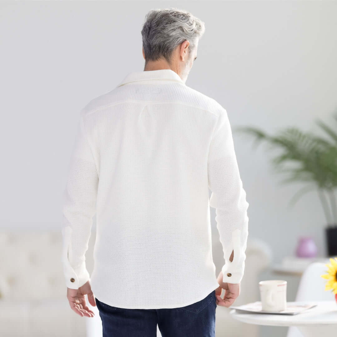 Back view of a man wearing a white Magnetic Front Waffle Weave Casual Shirt with dual oversized pockets.