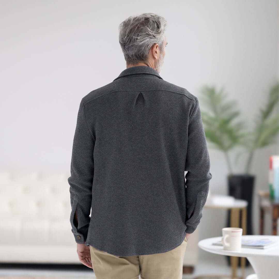 Back view of a man wearing a charcoal Magnetic Front WaffleWeave Casual Shirt in a stylish interior.