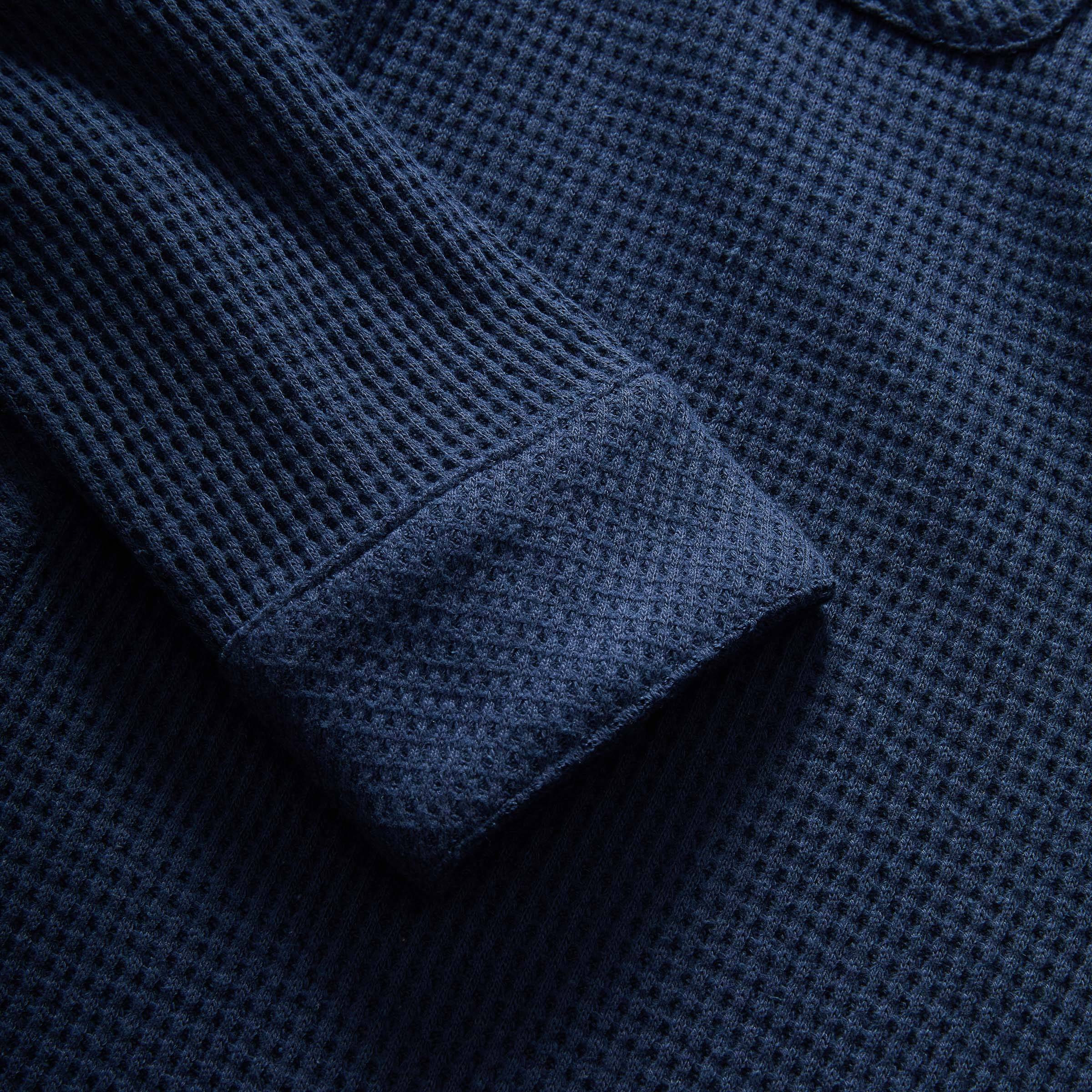 Close-up of navy waffle knit fabric showcasing the cuff of the Magnetic Front WaffleWeave Casual Shirt.