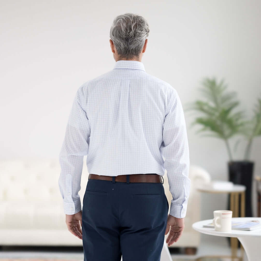Back view of a man wearing a Navy Grid Long Sleeve Shirt with Button-Down Collar and Magnetic Closures.