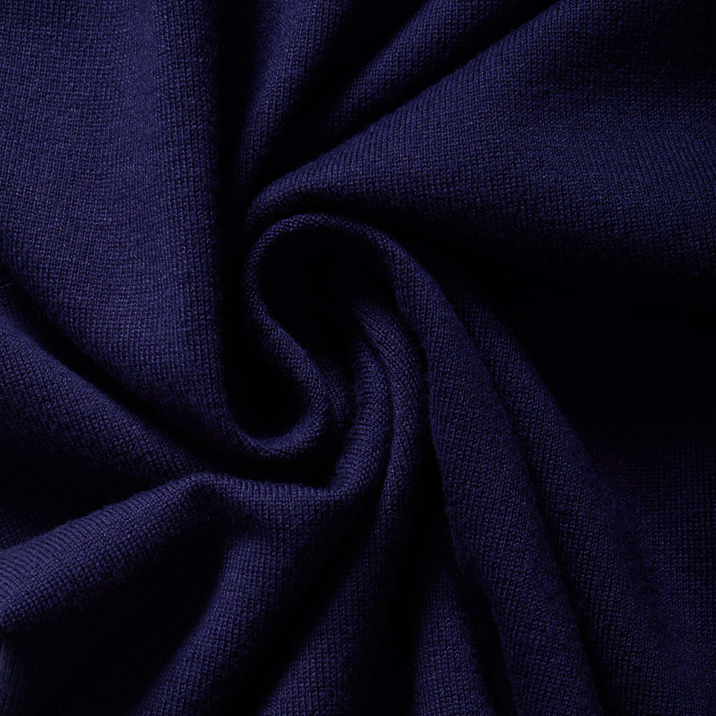 Close-up of soft navy knit fabric texture, showcasing the quality of the Women's Adaptive Magnetic Front Cardigan.