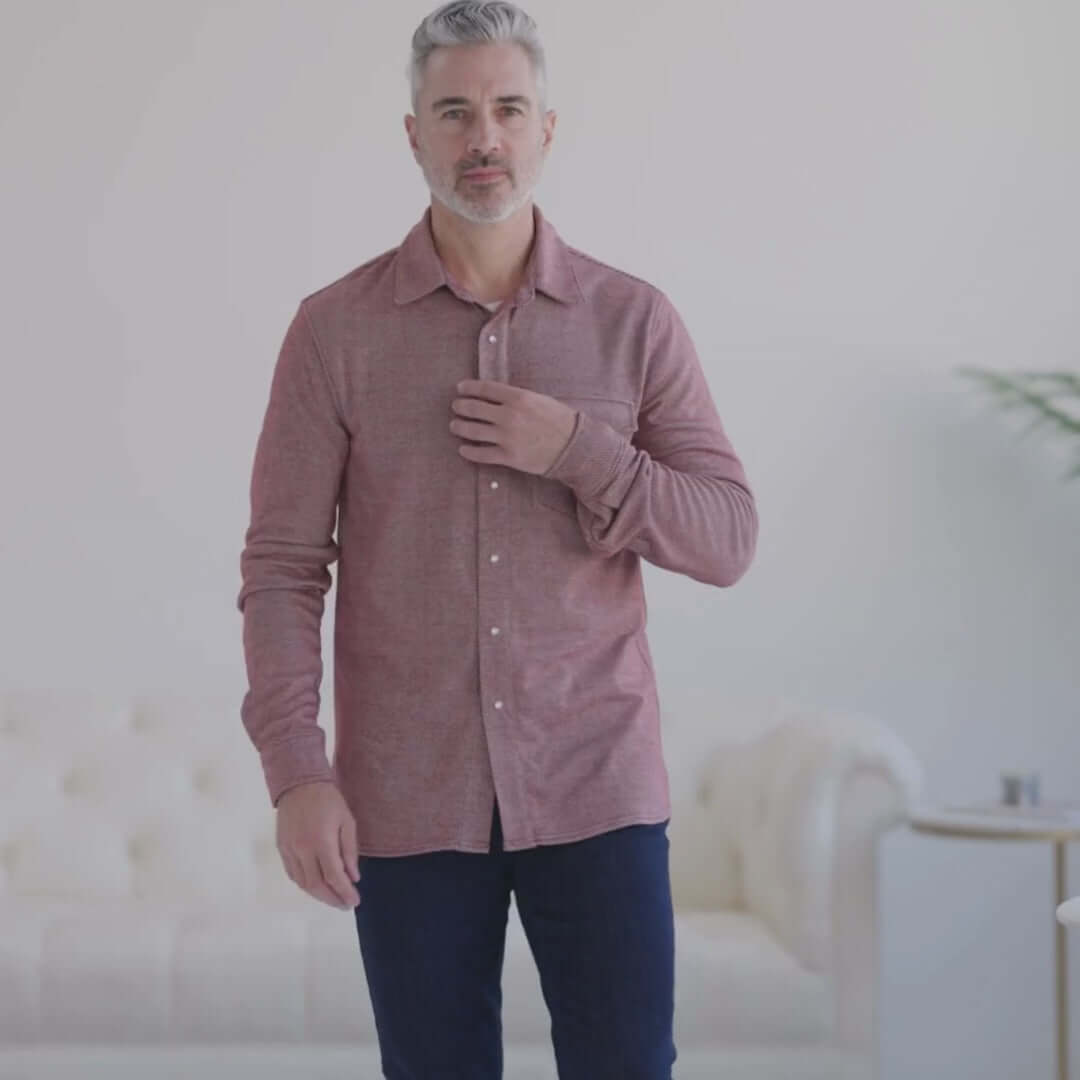 Man wearing a Rio Red adaptive Western twill knit shirt with magnetic buttons, showcasing style and comfort.