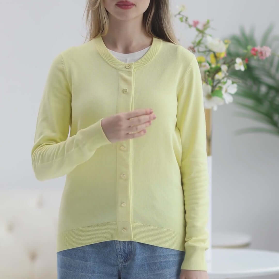 Women’s adaptive yellow cardigan sweater featuring front buttons and MagnaReady® magnetic technology for easy dressing.