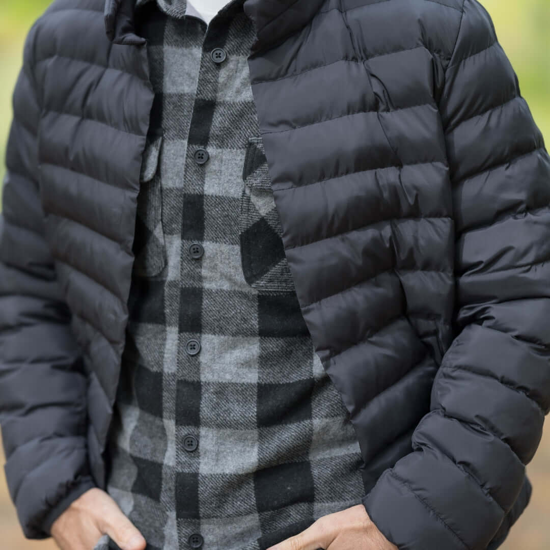 Weatherproof x MagnaReady black puffer jacket featuring magnetic closure, perfect for stylish outdoor wear.