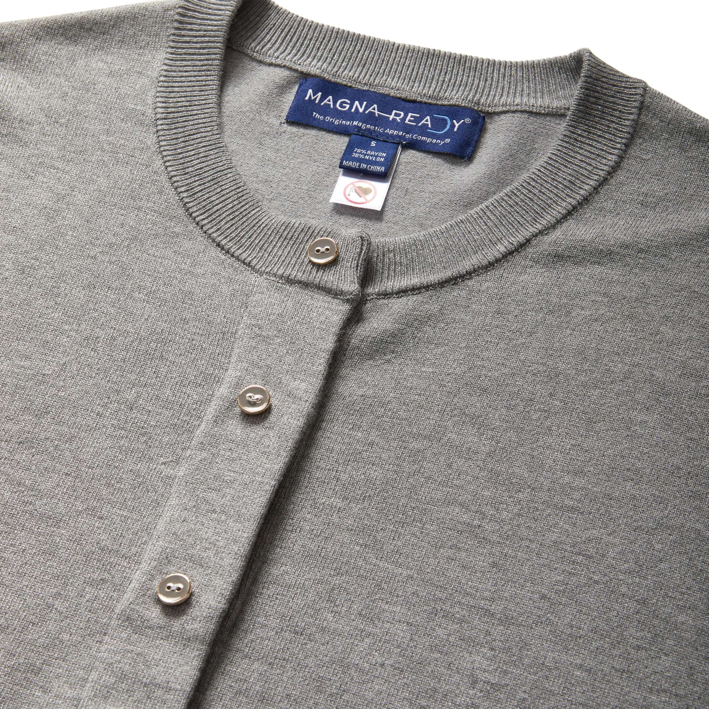 Close-up of a grey women's adaptive cardigan featuring MagnaReady® magnetic buttons for easy dressing.