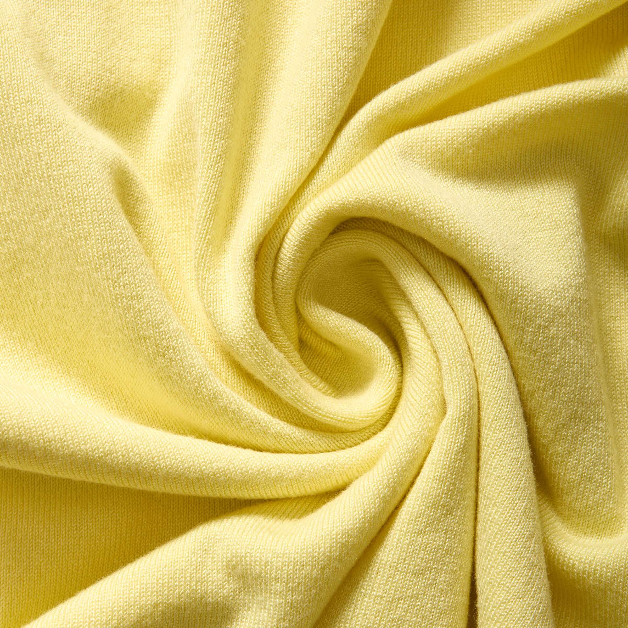 Yellow knit fabric showcasing soft texture for women's adaptive cardigan sweater.