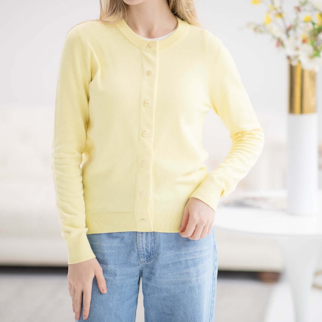 Women's adaptive yellow knit cardigan with magnetic front closures, perfect for easy dressing and stylish comfort.