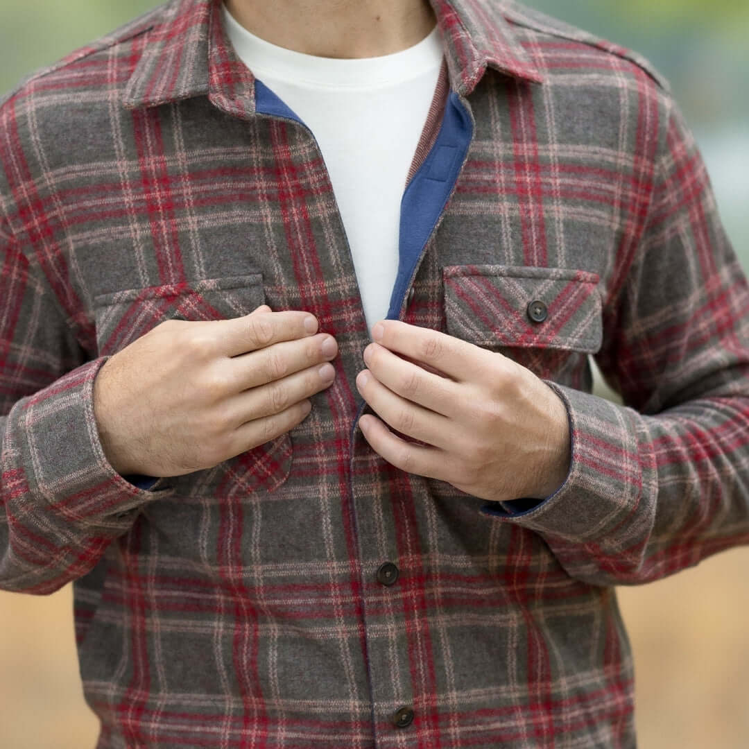 Men's adaptive brown glen plaid flannel shirt layered over a T-shirt, showcasing magnetic closures.