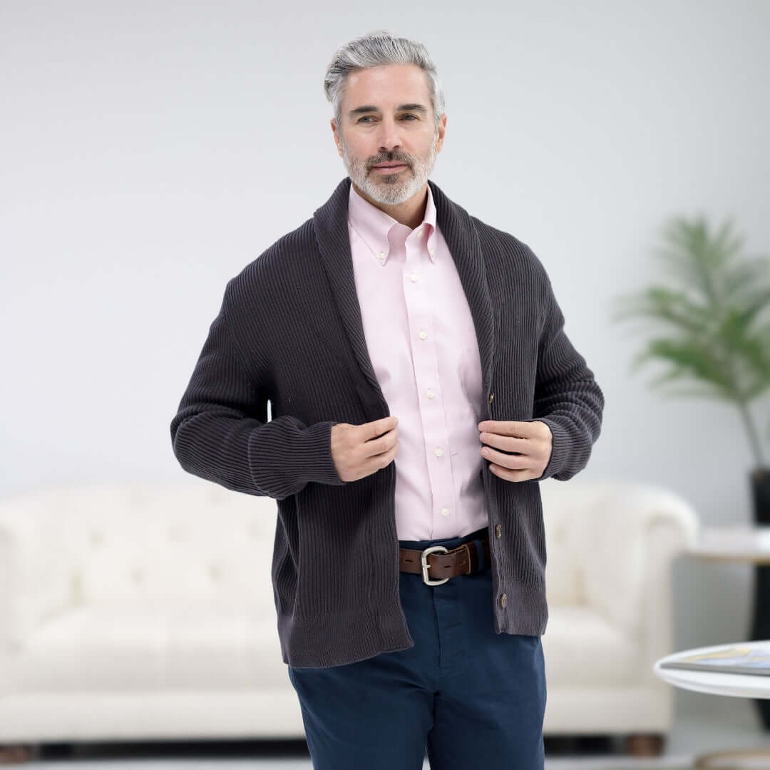 Man wearing Adaptive Ribbed Cotton Shawl Collar Cardigan in Charcoal with magnetic buttons and pockets.