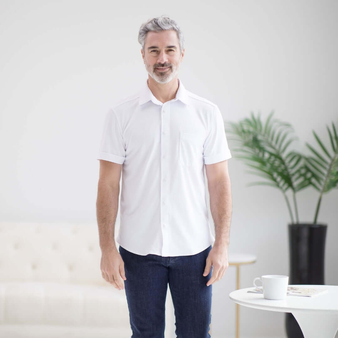 Adaptive cooling magnetic polo shirt for limited mobility, designed for comfort and independence in white.