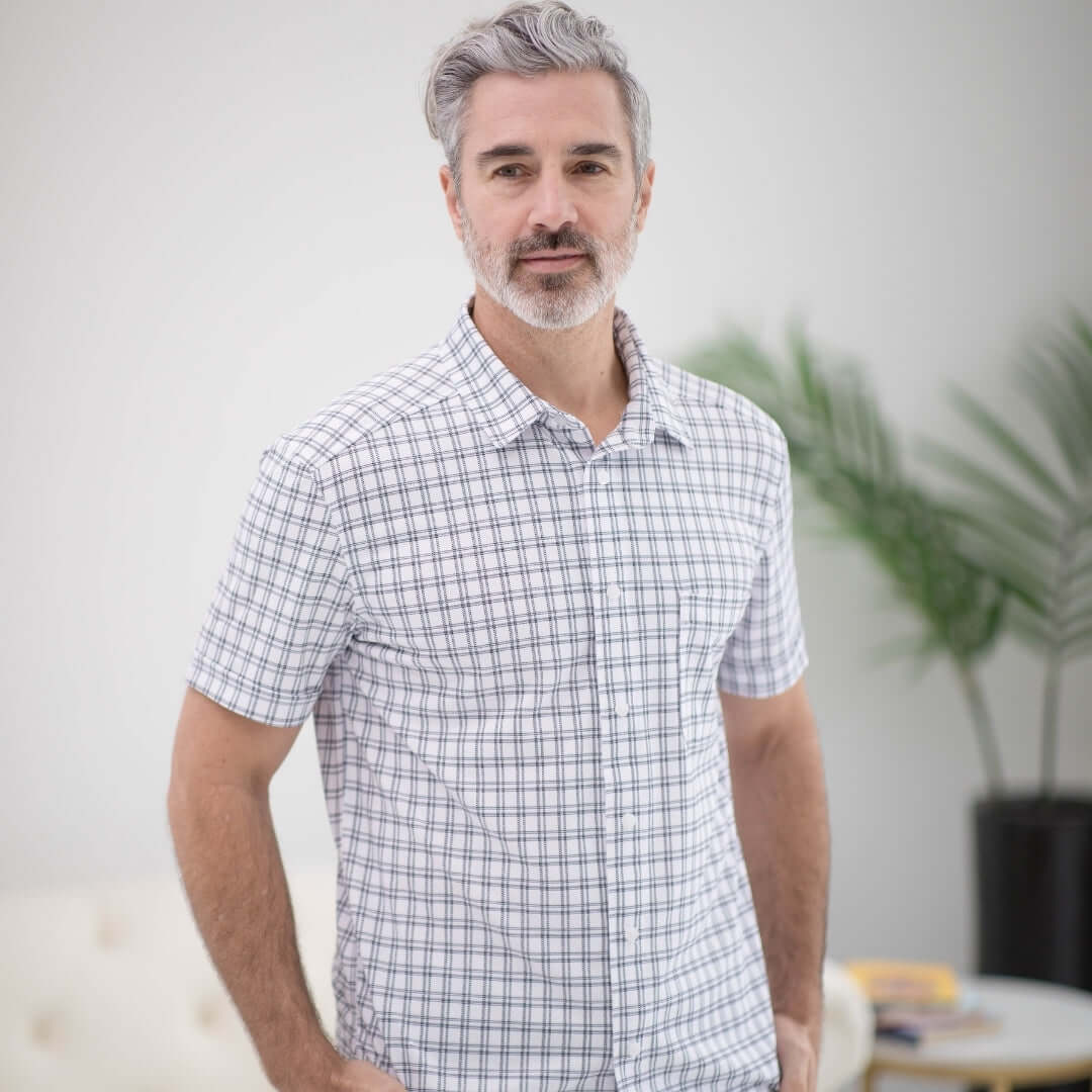 Adaptive cooling magnetic short sleeves shirt in black and white grid, designed for comfort and limited mobility support.