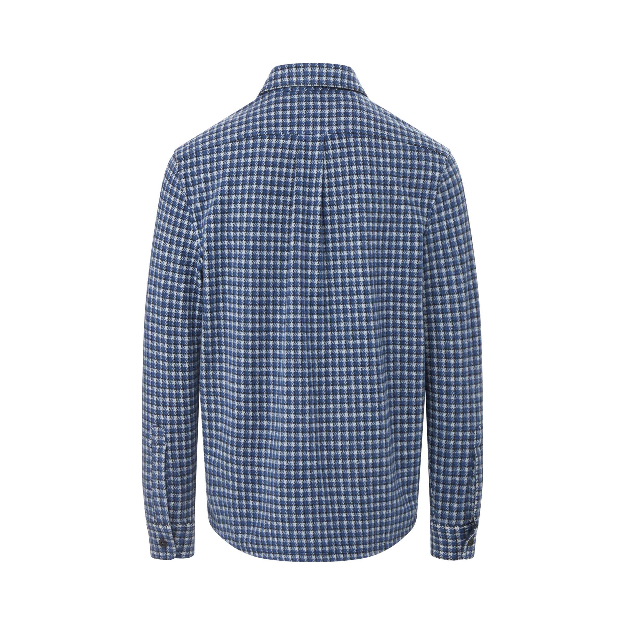 Back view of an Adaptive Long Sleeve White and Navy Check Flannel Shirt with magnetic closures for versatile layering.