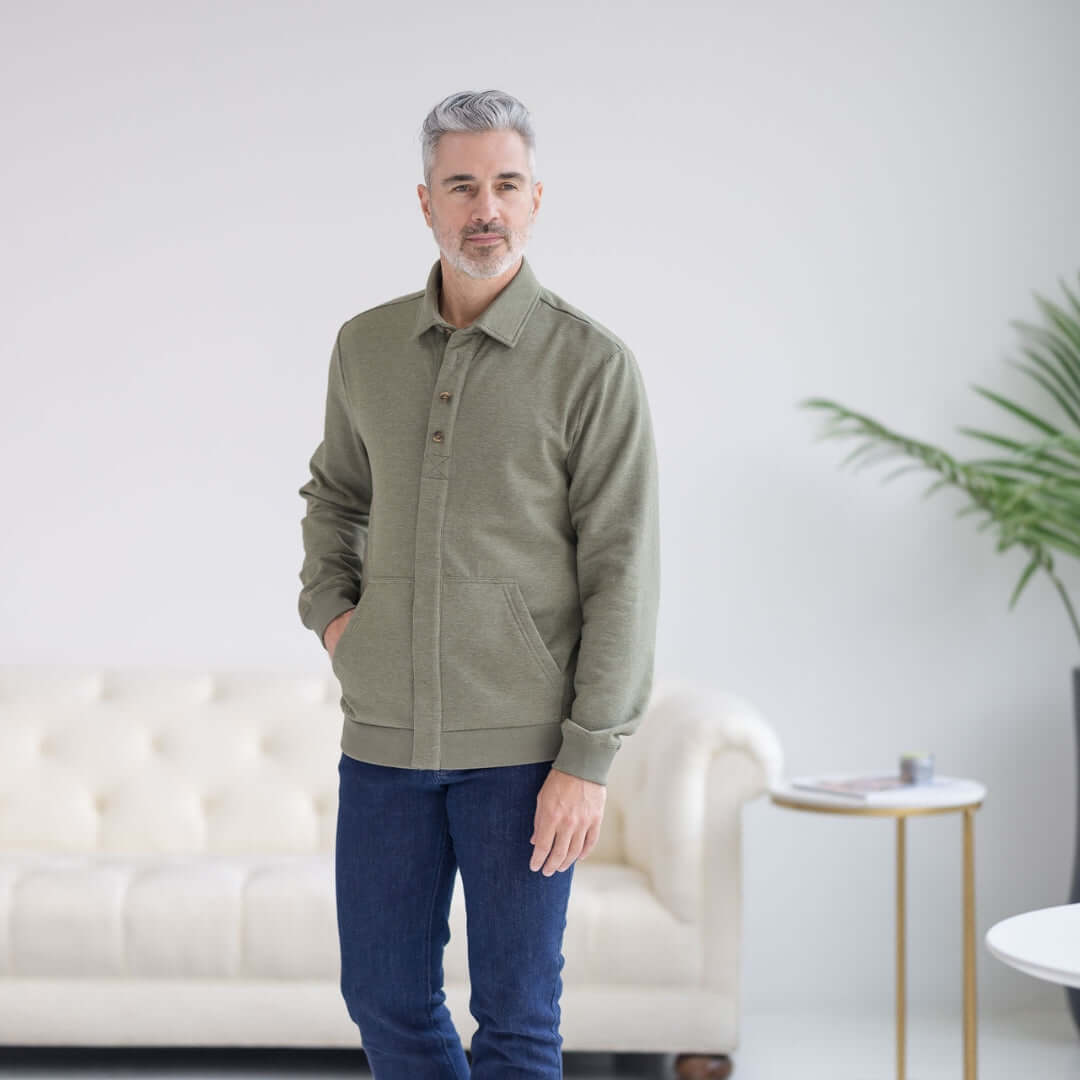 Man wearing the Adaptive Magnetic Front Sweatshirt in Heathered Olive, designed for comfort and ease of wear.