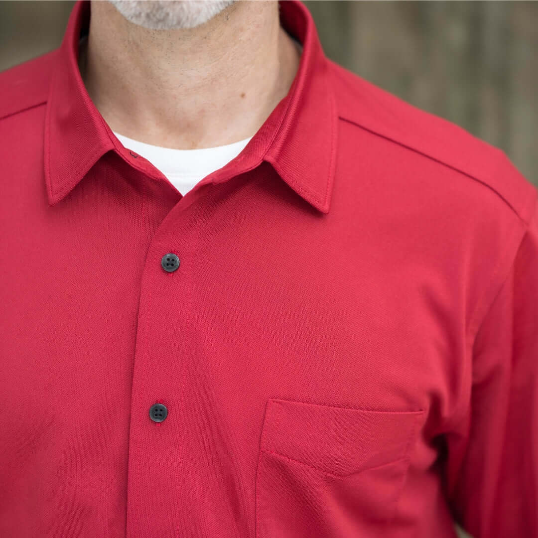 Men's adaptive Rio red long sleeve polo with pocket, featuring magnetic buttons for easy wear and comfort.