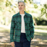 Adaptive Teal Plaid Flannel Shirt with Magnetic Closures worn by a man outdoors.