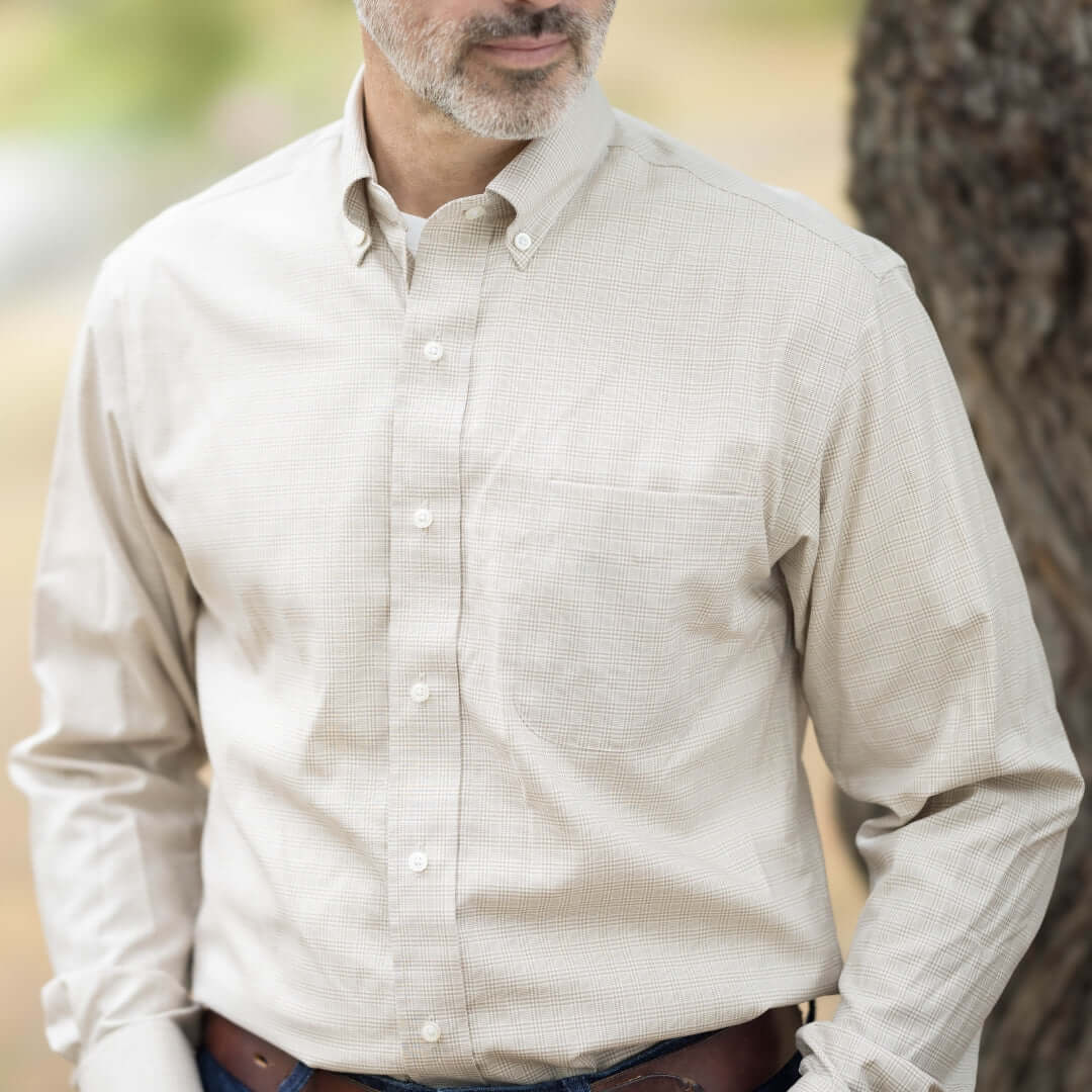 Beige check long sleeve button-down shirt with magnetic closures, styled for adaptive men's fashion.