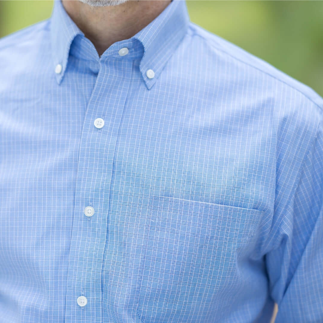Blue long sleeve button down shirt with magnetic closures for easy dressing. Ideal for individuals with mobility limitations.