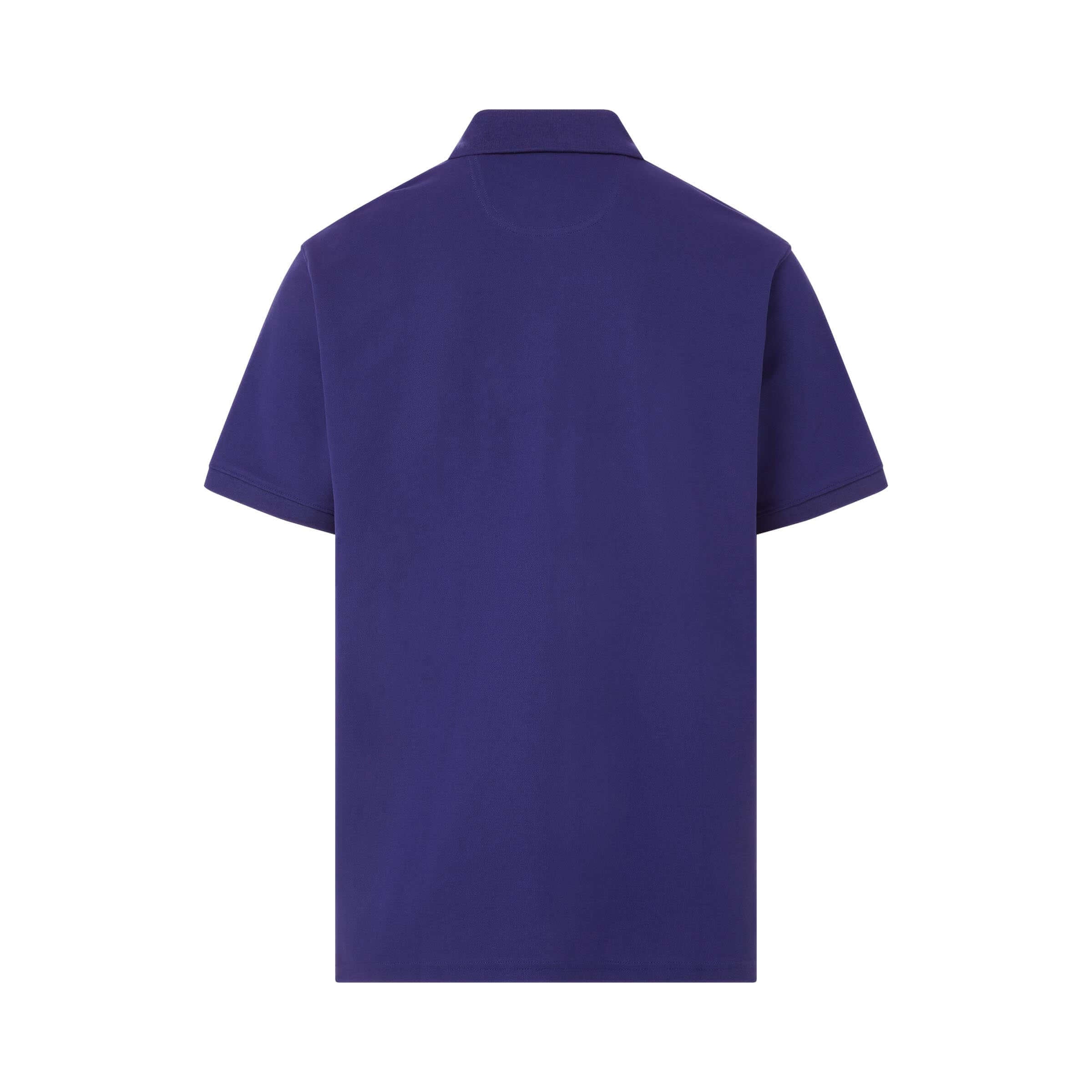 Back view of a blue pique knit short sleeve polo shirt with magnetic closures for easy dressing.