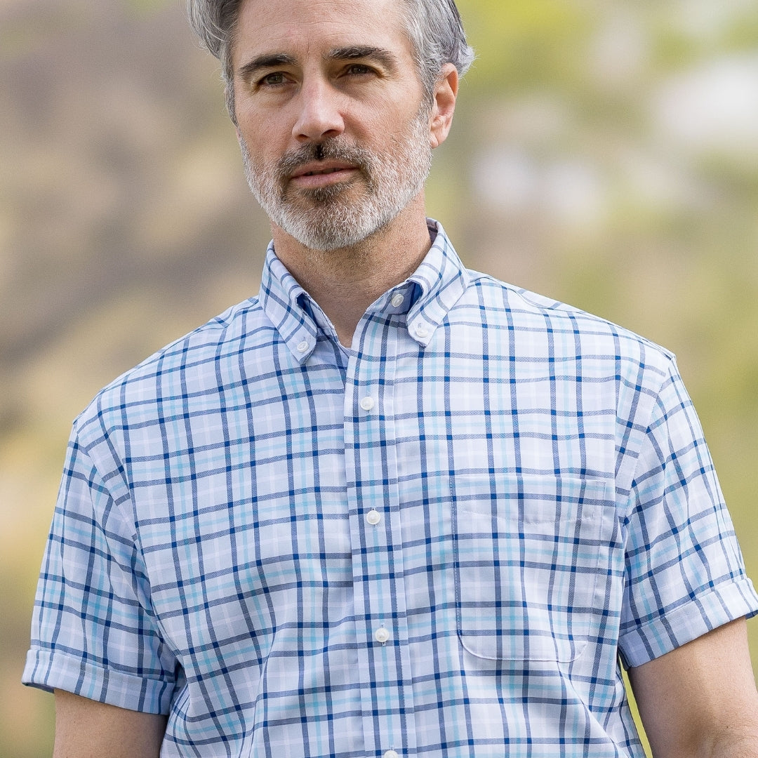 Blue Plaid Short Sleeve Shirt with Magnetic Closures, featuring a button-down collar and short sleeves in a traditional fit.
