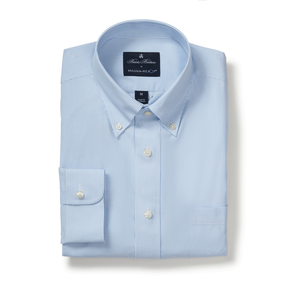 Brooks Brothers MagnaReady blue and white stripe polo button-down shirt with magnetic closures, folded neatly.