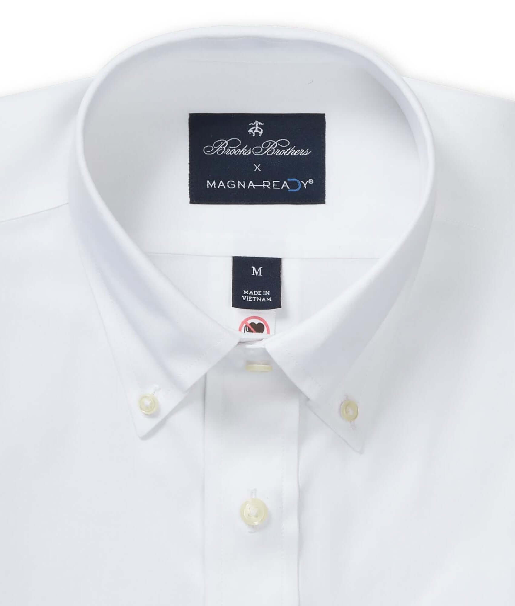 Brooks Brothers x MagnaReady white polo shirt close-up with button-down collar and adaptive magnetic closures.