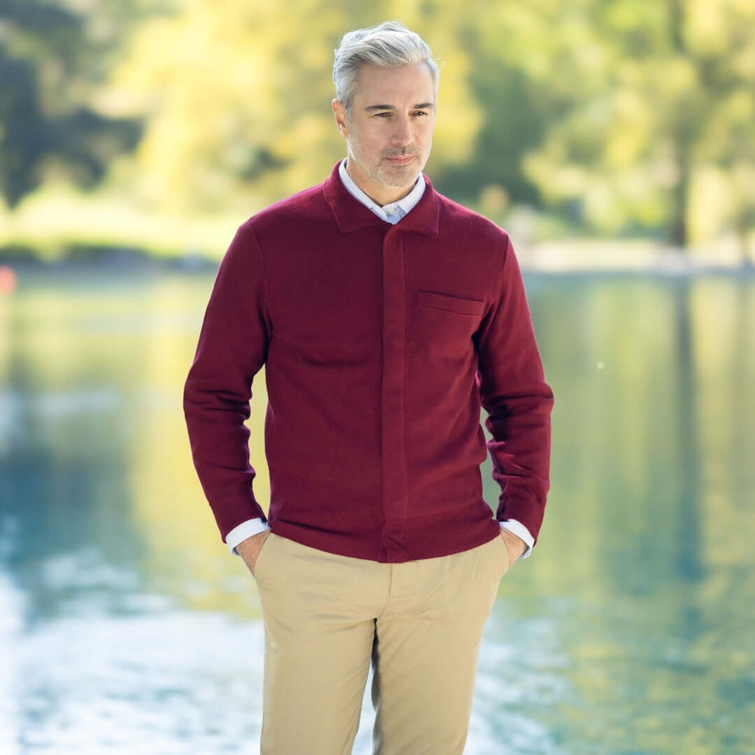 Classic Adaptive Sweater with Magnetic Front Closure and Pocket, modeled by a man near a serene lake.