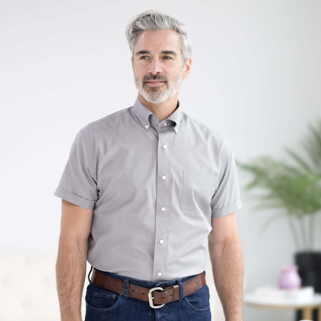 Dove grey short sleeve button-down collar shirt with magnetic closures, designed for comfort and style in adaptive wear.