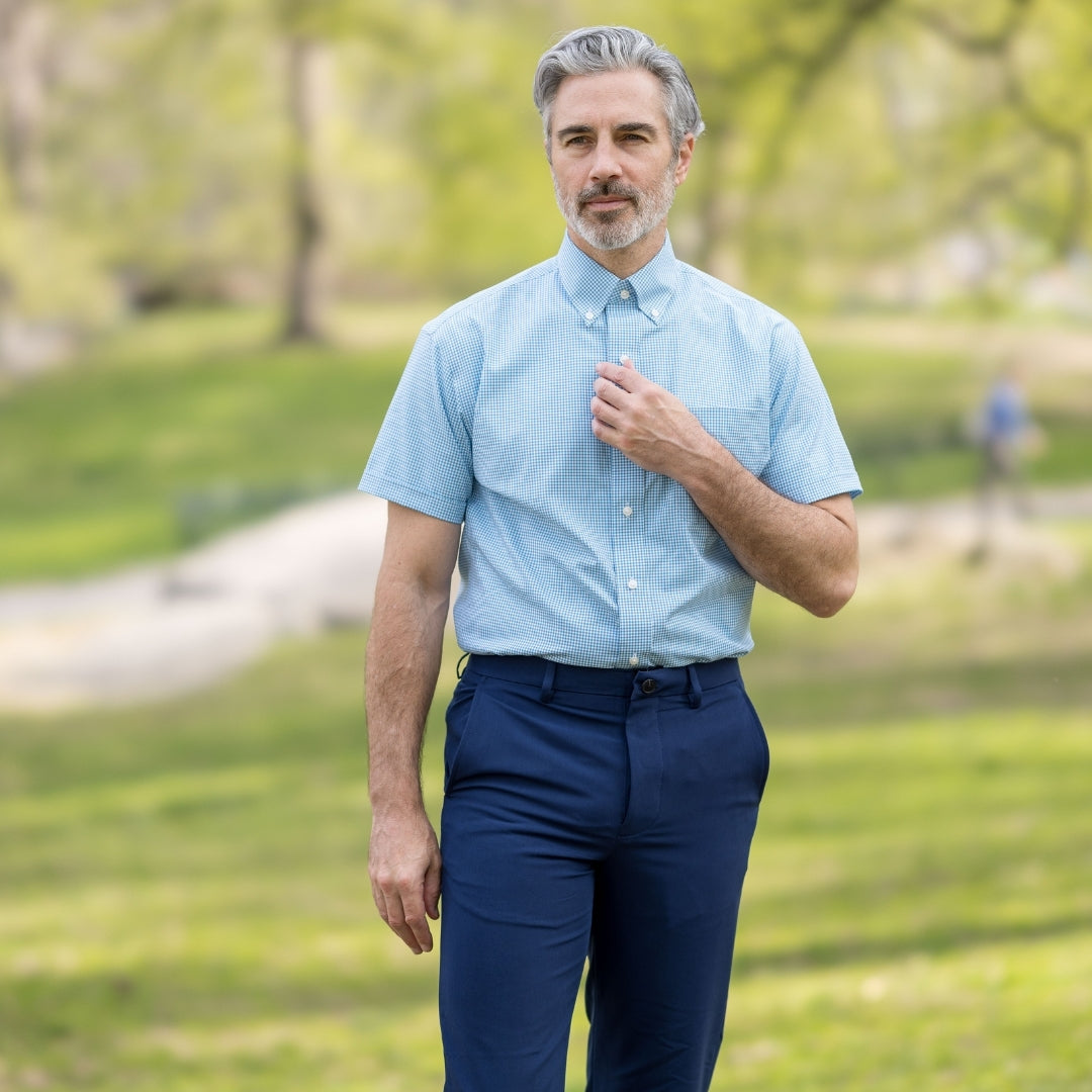 Green and Blue Check Short Sleeve Shirt with Magnetic Closures worn by a man in a park.