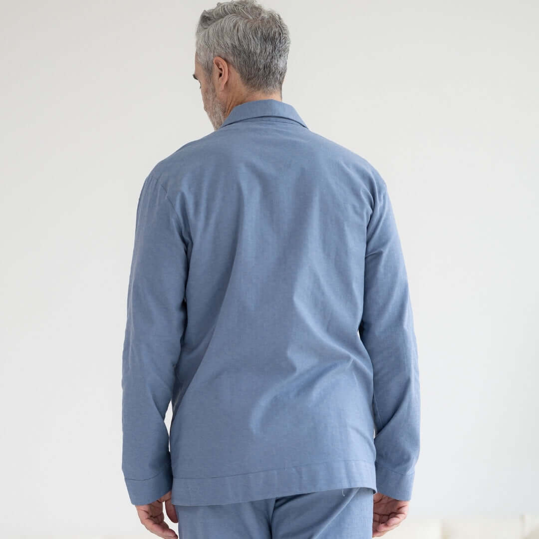 Long Sleeve Blue Brushed Flannel Pajama Top with Magnetic Closures worn by a man from behind.