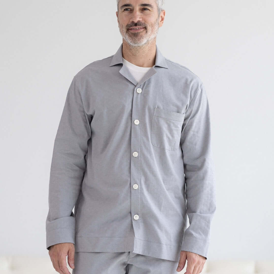 Long Sleeve Grey Pajama Top with Magnetic Closures worn by a smiling man in a bright room.
